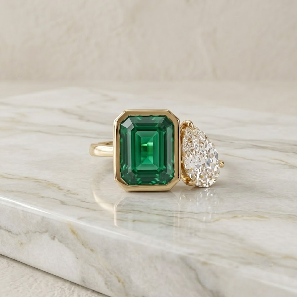 Toi et Moi Green Emerald Bezel and Pear Prong Ring